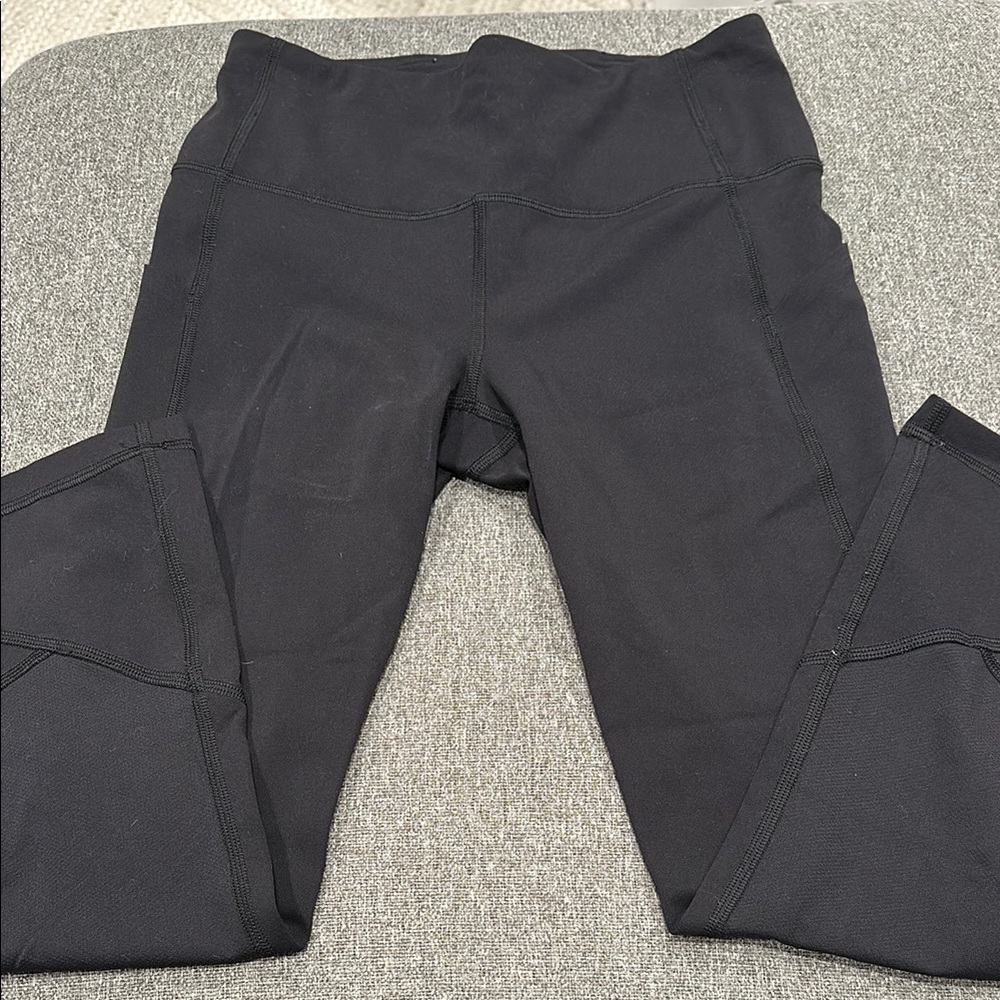lululemon athletica Black Leggings with Wide Waistband and Form-Fitting Design